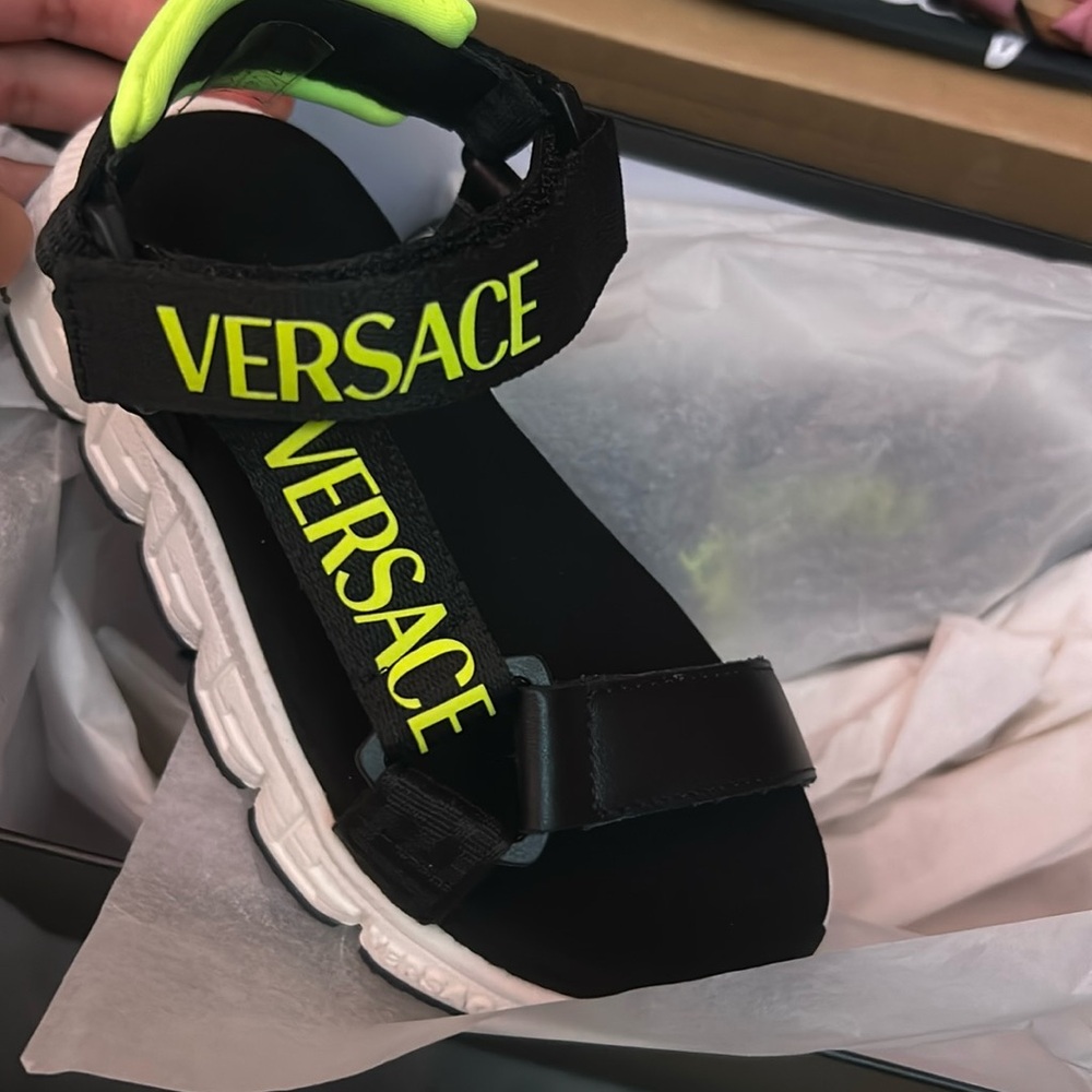 Brand New Versace Sandals, just received them and didnt fit my son!
